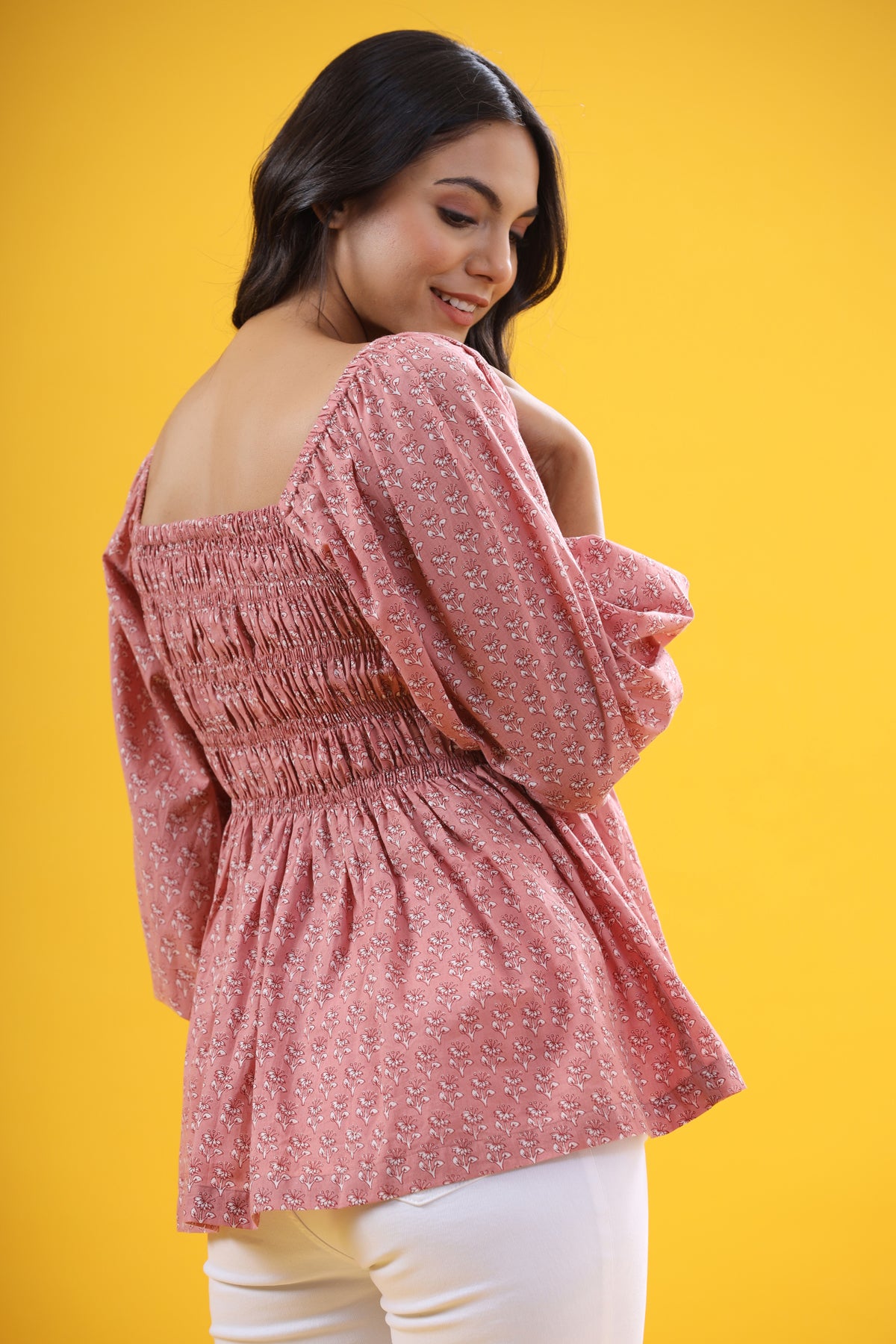 Floral Motifs on Pink Smocked Top